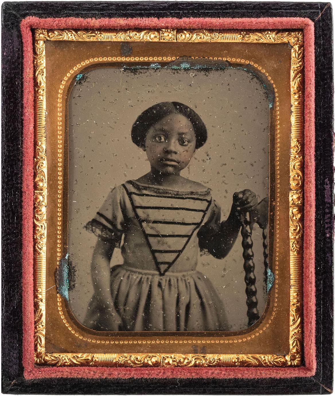 Old ambrotype photo of a young girl named Lucy